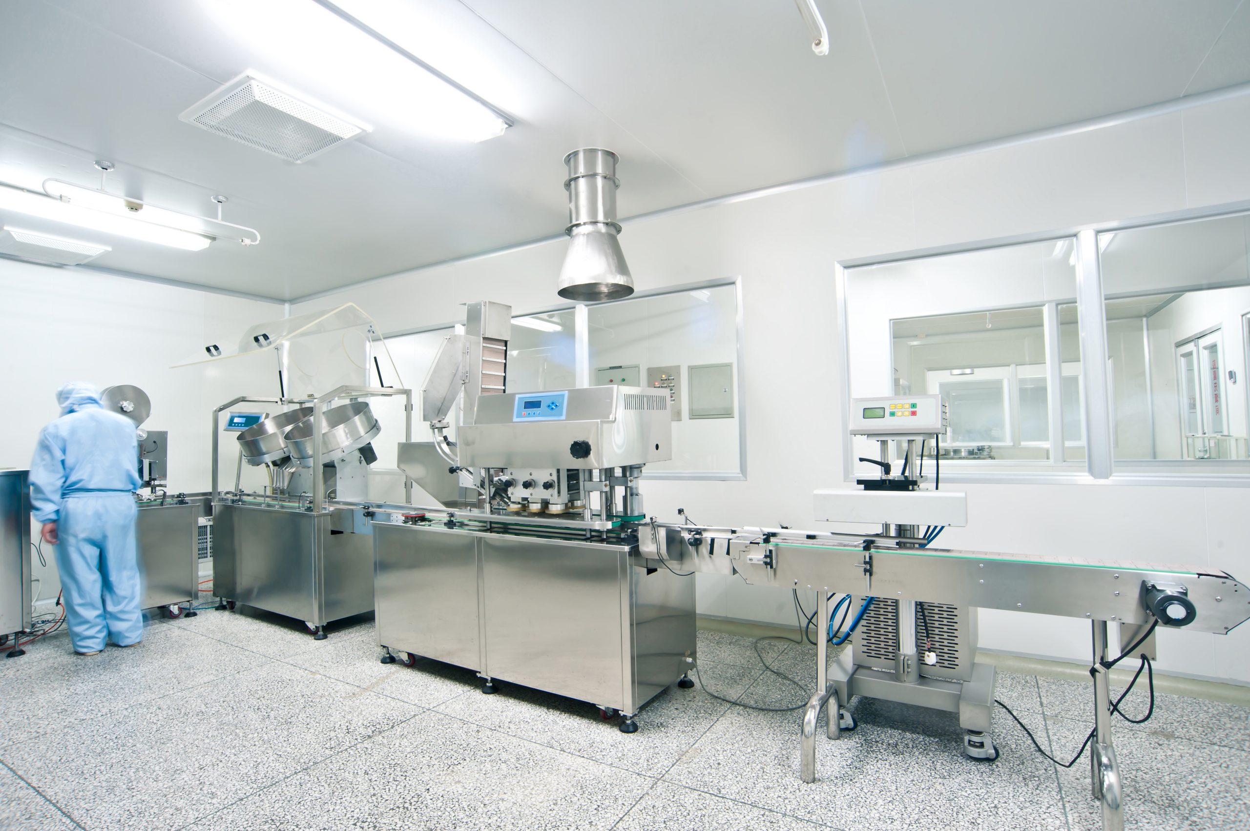 Technicians working in the pharmaceutical production line